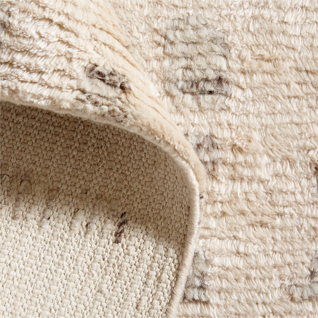 The TADART textured Wool-Blend Hand-Knotted Area Rug