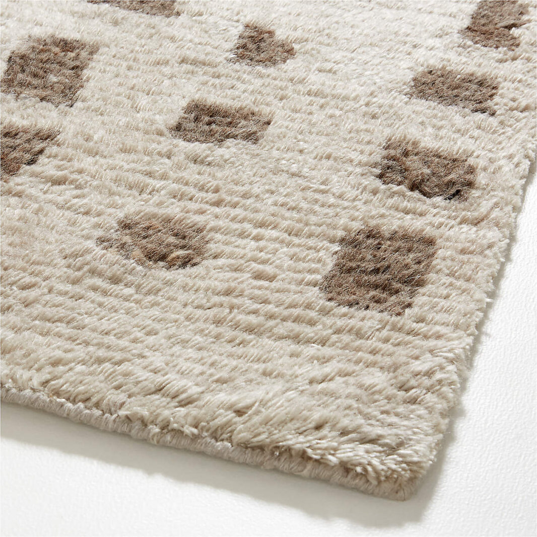 The TADART textured Wool-Blend Hand-Knotted Area Rug