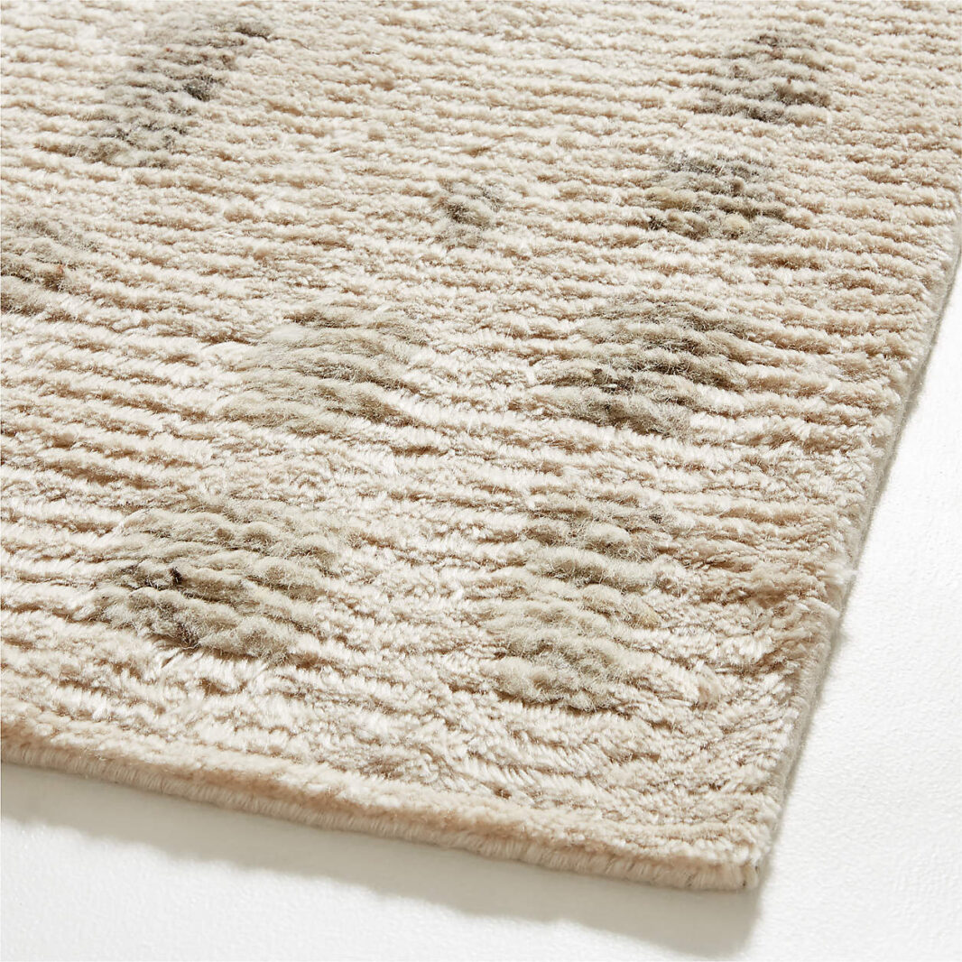 The TADART textured Wool-Blend Hand-Knotted Area Rug